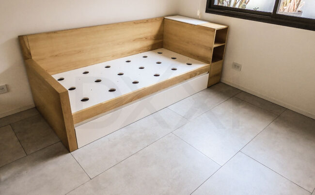 Cama con carro para colchón auxiliar modelo Antón - DXXI Fábrica de muebles contemporáneos y a medida